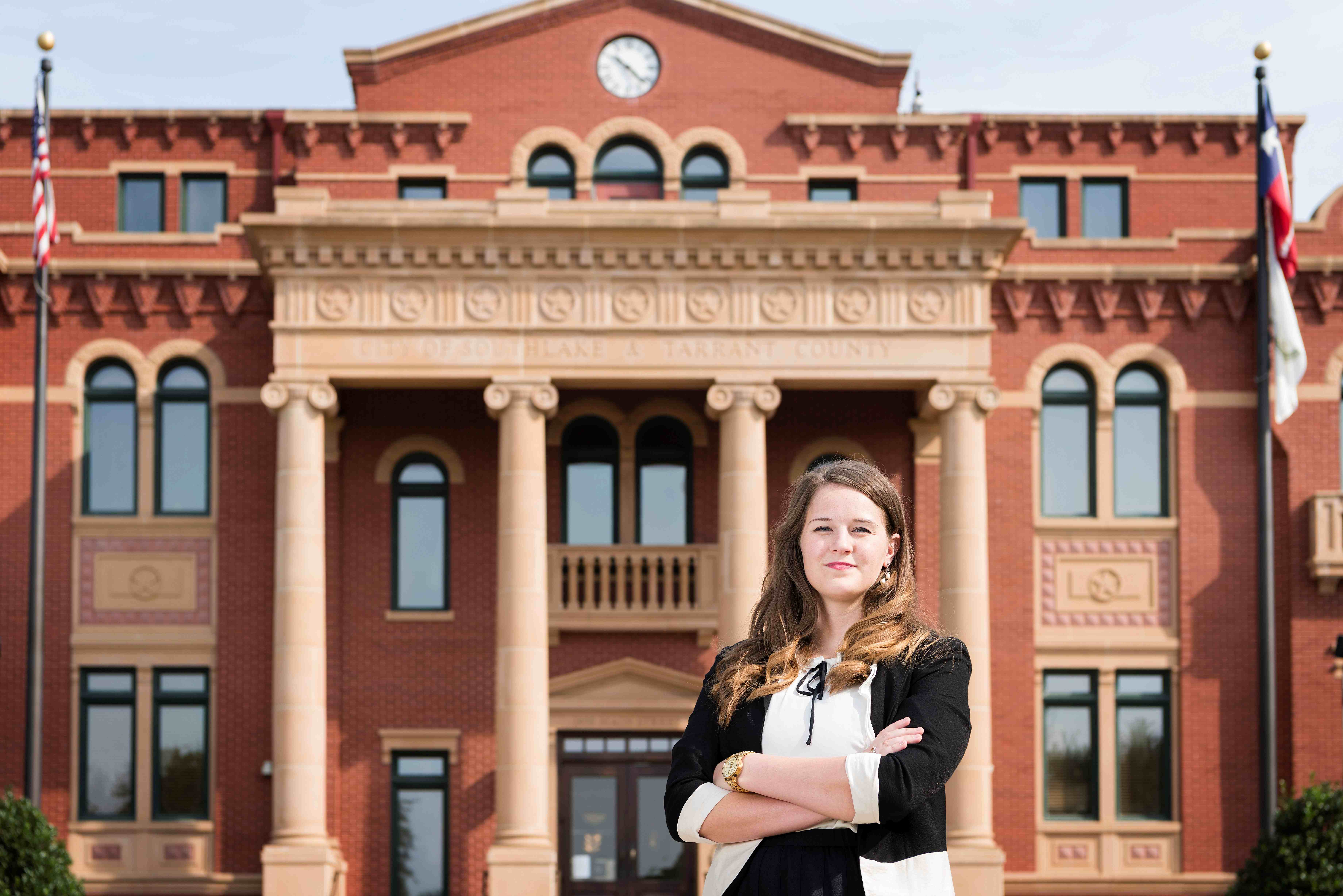 Woman in front of government building