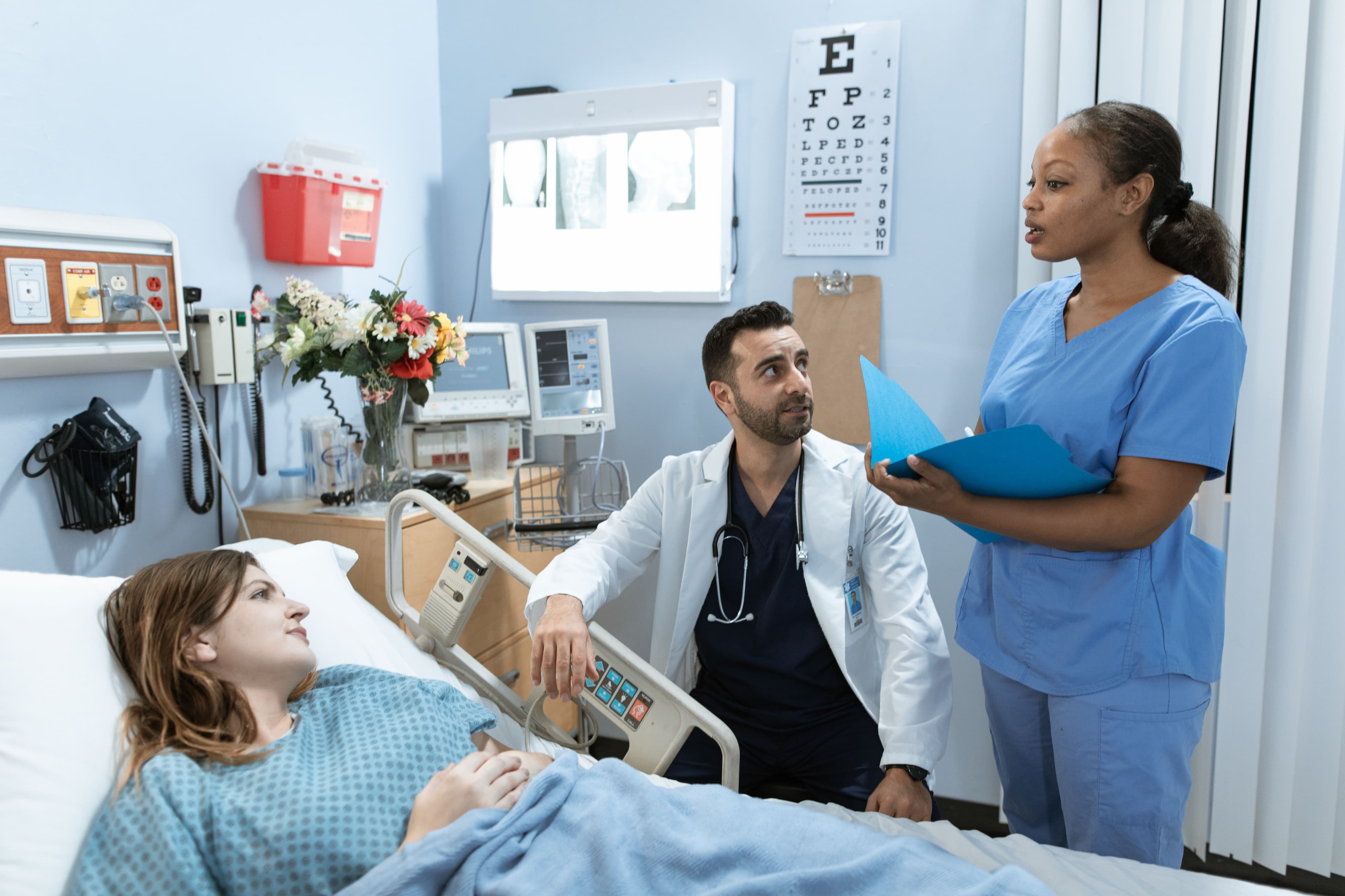 Nurse working with a patient